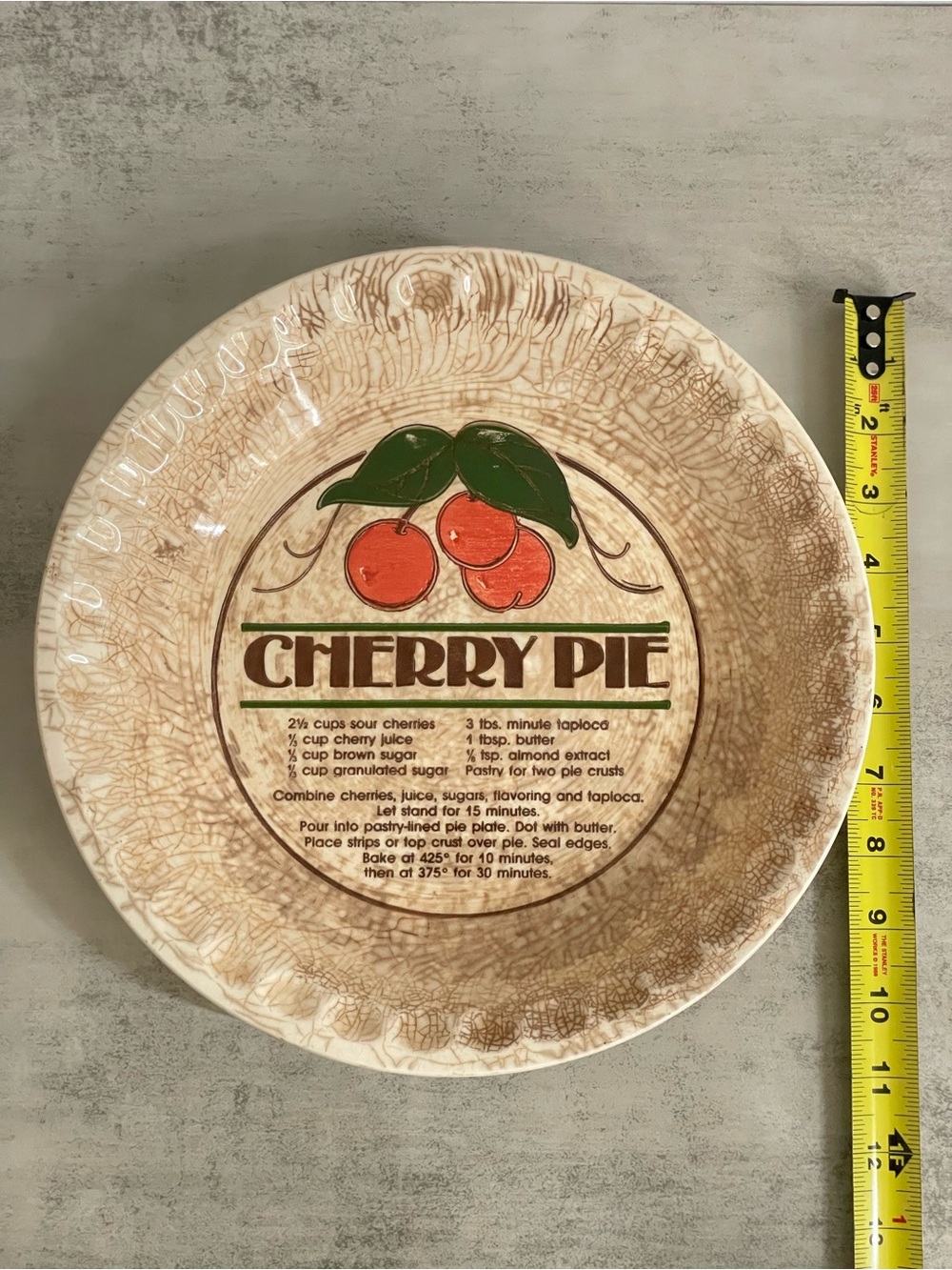 Crazed and stained cherry pie plate